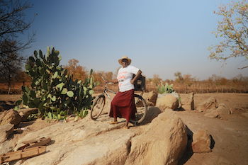 Three people discussing a report